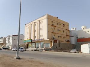 an empty street in front of a building at الشاطئ الذهبي in Jeddah