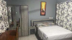 Photo de la galerie de l'établissement Okyeame Memorial Guesthouse - Royal Stayokay, à Bruburam