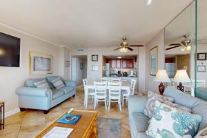 a living room with a couch and a table at Ocean Creek Plantation D-5 in Myrtle Beach