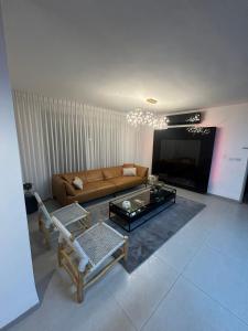 Χώρος καθιστικού στο Amar Luxury