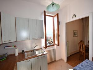 a kitchen with a sink and a window at Spacious Retreat in Cannero in Cannero Riviera