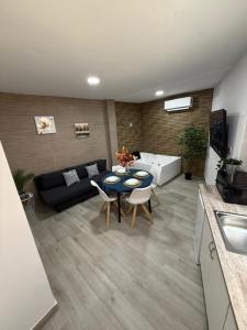 Un lugar para sentarse en Apartamento BF Jacuzzi Jerez