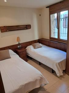 Postel nebo postele na pokoji v ubytování Viladrau Paz y Naturaleza