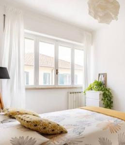 Postel nebo postele na pokoji v ubytování Appartamento Centralissimo