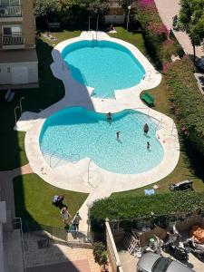 Bazén v ubytování Luxury Sea View Fuengirola nebo v jeho okolí