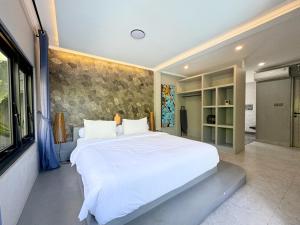 Postel nebo postele na pokoji v ubytování Villa Marissan