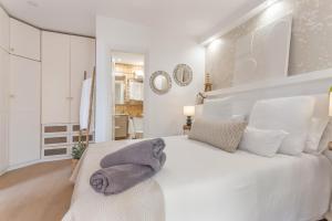 Ένα ή περισσότερα κρεβάτια σε δωμάτιο στο Villa Toro 2