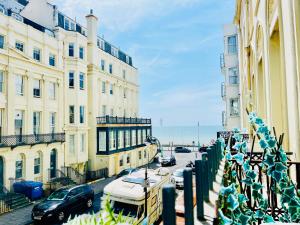 a view of a street with buildings and cars at Hangover Hotel - Seafront 8 in Brighton & Hove +45 photos
