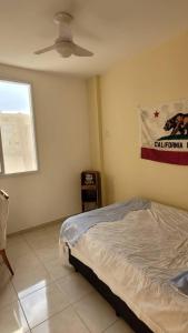 Postel nebo postele na pokoji v ubytování Quarto entre Centro & Cambuí