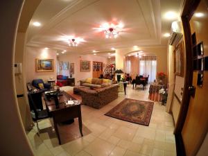 an overhead view of a living room with a couch at Villa Eden in Corbara