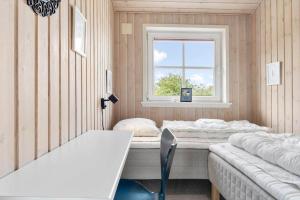 Postel nebo postele na pokoji v ubytování 0222-Romo-Kromosevej-20-A