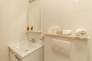 Ένα μπάνιο στο Apartments and Rooms Bonkan Hvar