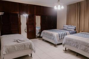 Ένα ή περισσότερα κρεβάτια σε δωμάτιο στο Go Bed & Breakfast