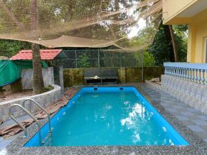 La alberca dentro o cerca de 2BHK Apartment in Majorda