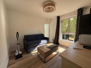 Χώρος καθιστικού στο Appartement neuf Palais des Congrès Porte Maillot 30 +1 φωτογραφίες