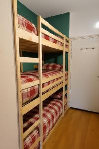 Postel nebo postele na pokoji v ubytování Famili'ski - Votre cocon familial aux Angles + 5 fotografií