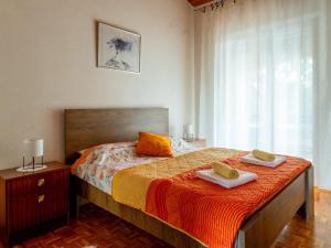 Postel nebo postele na pokoji v ubytování Spacious Holiday Home in Verteneglio