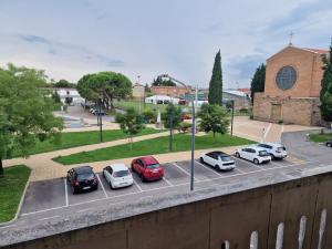a group of cars parked in a parking lot at Casa Gemma in Padova