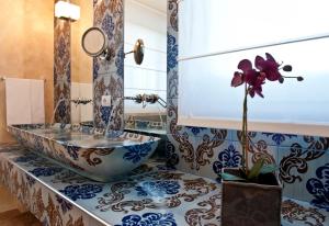 Ванная комната в Villa Neri Resort & Spa