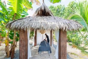 Κήπος έξω από το The Mastic Cana Luxury Cottage