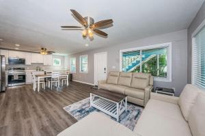 a living room with a couch and a table at 2 Bedroom Beachside Suite in Clearwater Beach
