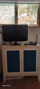 TV a/nebo společenská místnost v ubytování Studio loft au cœur du var