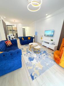 TV a/nebo společenská místnost v ubytování Talia Accomodations