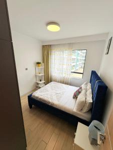 Postel nebo postele na pokoji v ubytování Talia Accomodations