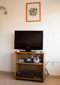 TV tai viihdekeskus majoituspaikassa Apartment Gulić