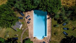Bazén v ubytování SCAPPO IN UMBRIA, La Casa nel bosco nebo v jeho okolí + 37 fotografií