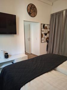 En eller flere senge i et værelse på Urban-Chic-Zentral-Bahnhof-Altstadt-Mediapaket-W2