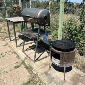 a grill and a bbq grill and a barrel at Pokito House on the Hill in Sremski Karlovci +19 photos