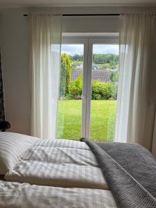 Postel nebo postele na pokoji v ubytování Rückzugsort im Sauerland