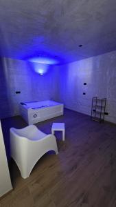 a room with a bed and a table and a chair at Raggio di Sole 5 P3 in Bari