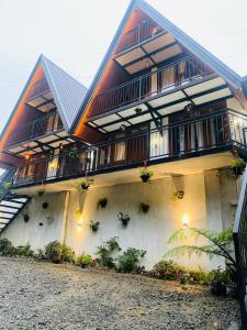 a building with plants on the side of it at Sithgiri Drem line cottage in Nuwara Eliya