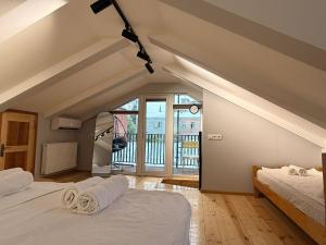 Ένα ή περισσότερα κρεβάτια σε δωμάτιο στο Dinamo House