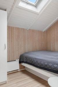 Giường trong phòng chung tại 0304-Romo-Vestergade-3-Ap-58