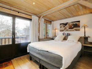 Katil atau katil-katil dalam bilik di Appartement de standing à Courchevel - 3 chambres, parking, accès pistes, vue sur la vallée - FR-1-575-236