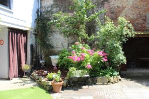 A patio or other outdoor area at Hypnos Hotel