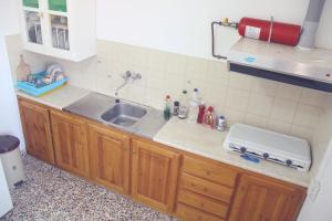 Kuchyň nebo kuchyňský kout v ubytování Αlexandros apartment