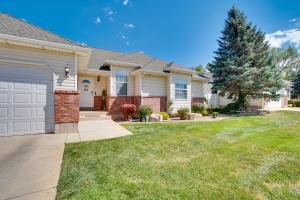 a house with a driveway and a garage at Hike and Explore in Cedar City! Studio Guest Suite in Cedar City