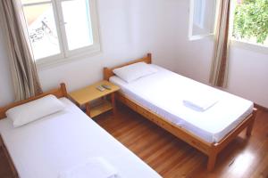 Postel nebo postele na pokoji v ubytování Αlexandros apartment