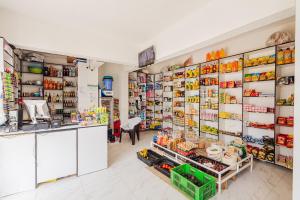 a grocery store with a lot of products on the shelves at Ultimate Safari Retreat,9min to Nairobi JKIA with Pool,Gym,WiFi and Binocular views in Nairobi