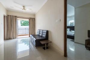 TV a/nebo společenská místnost v ubytování Hotel Mount Kailash Suites