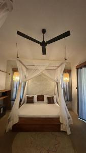 Katil atau katil-katil dalam bilik di Salida Beach Zanzibar