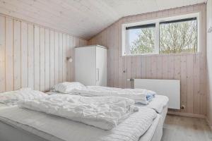 Postel nebo postele na pokoji v ubytování 0259-Romo-Lyngvejen-89-B