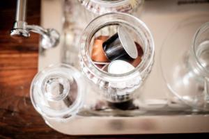 a close up of a glass container with utensils at The Queen's Head in Kingston upon Thames +170 photos