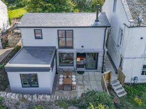 an aerial view of a white house with a patio at Wash House - Tayport in Dundee
