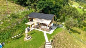 an overhead view of a small house on a hill at Montis House in Vişeu de Mijloc