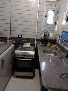Dapur atau dapur kecil di شقق المكان الرائع بجوار البحر +5 gambar